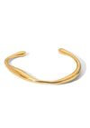Kvinnors manschettarmband - elegant guldaccessoar för vardag eller kvällsutflykter