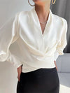 Damatopp för damer - elegant blus med puffärmar