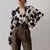 Dam blus i chiffon - elegant långärmad topp med klassisk svart och beige mönster