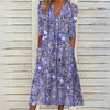 Blommig midiklänning - stilren sommardress med fickor
