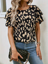 Kvinnors leopardmönstrad blus med kort ärm - elegant och avslappnad outfit för damer