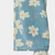 Blå denimbyxor med vida ben och blommönster