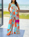 Kvinnlig jumpsuit med vida ben - trendig sommaroutfit för avslappnat eller kvällsevenemang