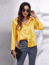 Kvinnors satinblus - elegant långärmad topp för smart casual stil