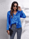 Kvinnors satinblus - elegant långärmad topp för smart casual stil