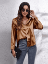Kvinnors satinblus - elegant långärmad topp för smart casual stil