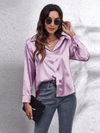 Kvinnors satinblus - elegant långärmad topp för smart casual stil
