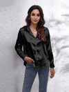 Kvinnors satinblus - elegant långärmad topp för smart casual stil