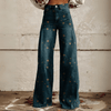 Kvinnors vintage blommiga vida byxor - boho denim med vit blommönster