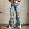 Kvinnors vintage blommiga vida byxor - boho denim med vit blommönster