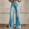 Kvinnors vintage blommiga vida byxor - boho denim med vit blommönster